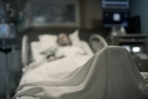patient lying on a hospital bed