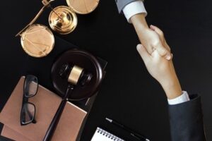 top view of someone shaking hands